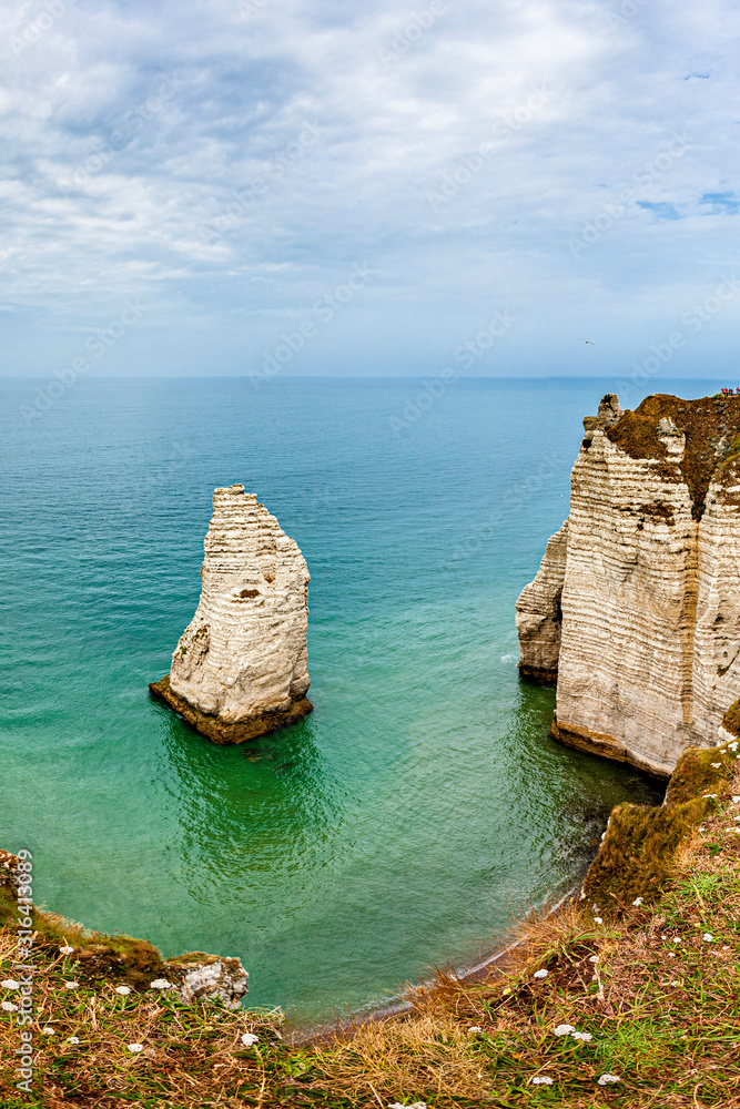 View of natural chalk cliffs of Etretat and beach coastline, Normandy, France, Europe