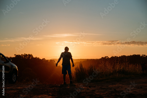 man at sunset light