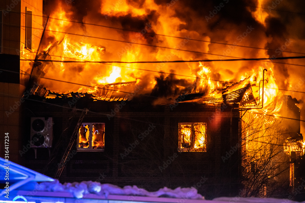 firefighters extinguish burning house in the dark, Burning building in Samara, Russia firefighters extinguish burning house in the dark, Burning building in Samara, Russia