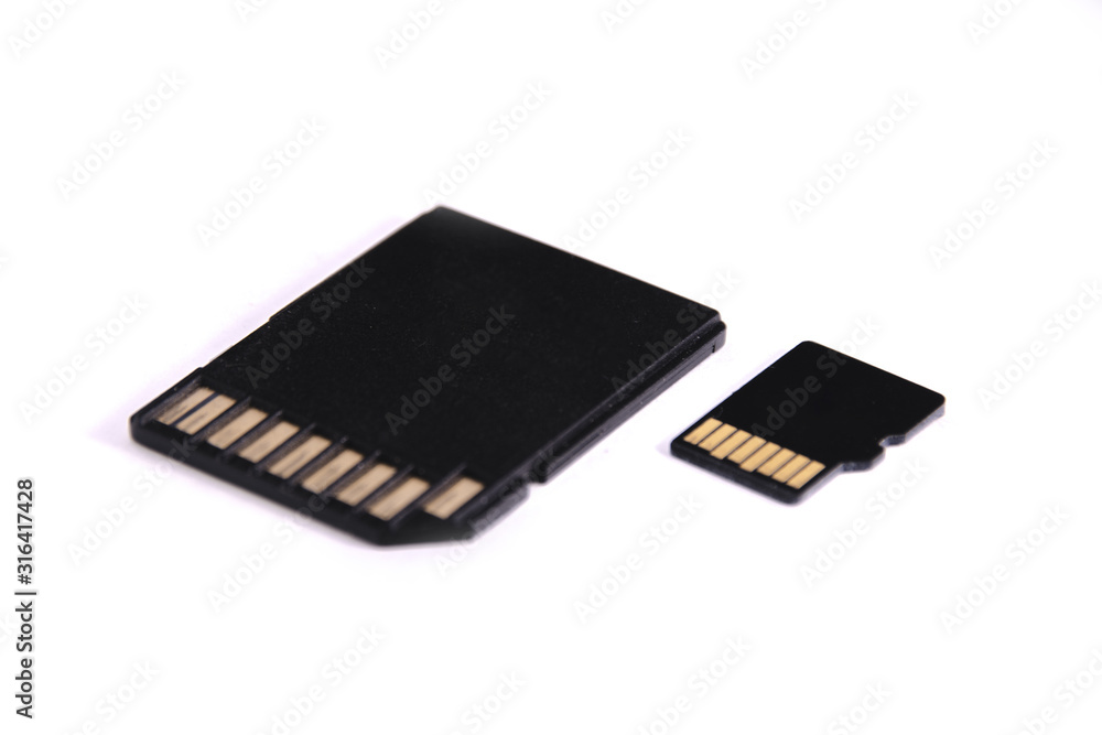 SD and microSD Memory card for digital camera. These two secure digital compact flash memory sticks are isolated on a white background. Clipping path inside. SD and microSD Memory card for digital camera. These two secure digital compact flash memory sticks are isolated on a white background. Clipping path inside.