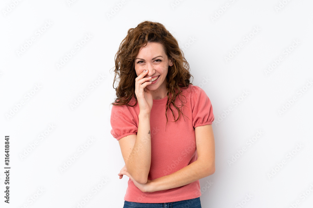 Young pretty woman over isolated background smiling a lot Young pretty woman over isolated background smiling a lot