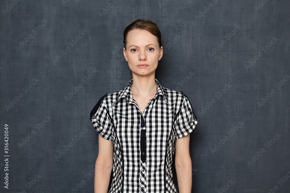 Portrait of serious focused young blond woman Portrait of serious focused young blond woman