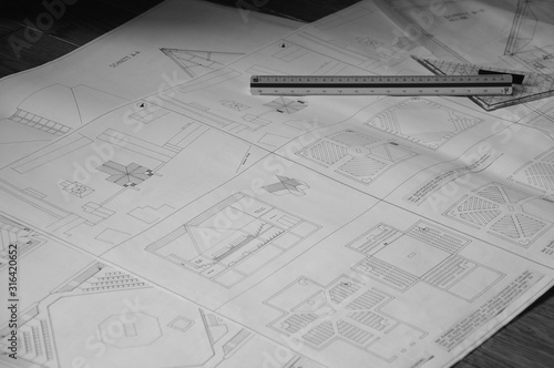 blueprint for a church building on paper with triangle ruler
