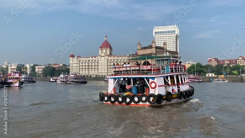 Ferry boat approching Mumbai Port, Gateway Of India, Apollo Bunder, Taj Mahal Palace Hotel Mumbai, Colaba photo