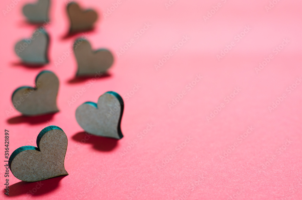 wooden hearts on a red background 2 wooden hearts on a red background 2