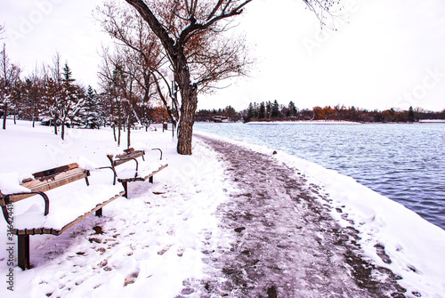 Peaceful quiet pathway along the Wascana creek in winter time. photo