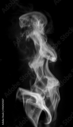 Fototapeta Naklejka Na Ścianę i Meble -  Smoke or steam on black isolated background for insertion image in overlay mode_