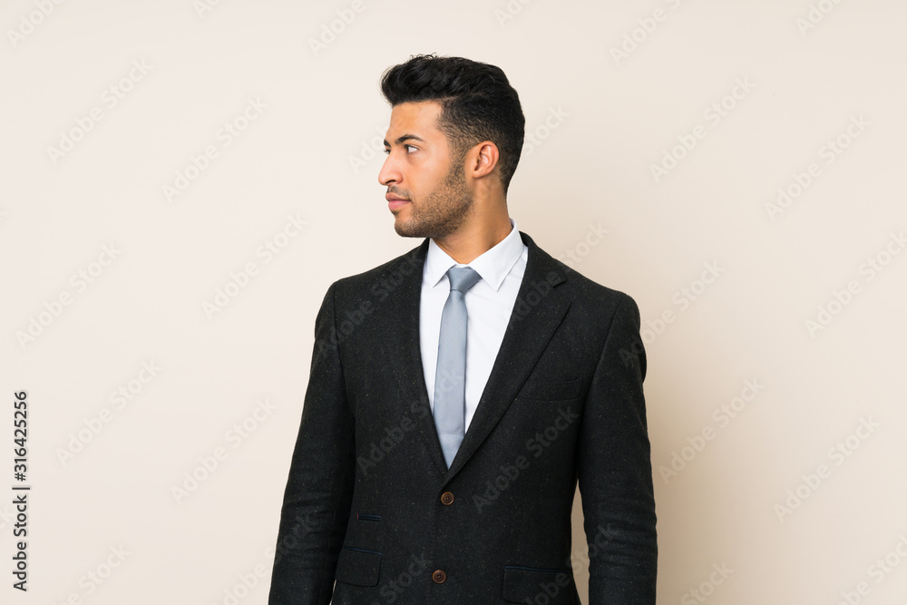 Young handsome businessman man over isolated background looking side Young handsome businessman man over isolated background looking side