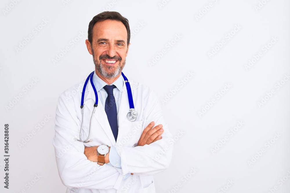 Middle age doctor man wearing coat and stethoscope standing over isolated white background happy face smiling with crossed arms looking at the camera. Positive person. Middle age doctor man wearing coat and stethoscope standing over isolated white background happy face smiling with crossed arms looking at the camera. Positive person.