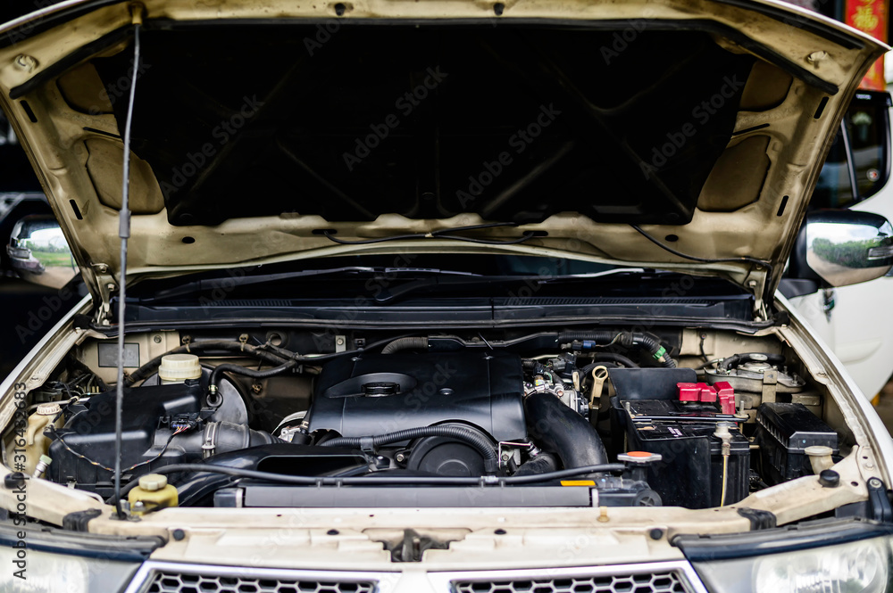 Obraz premium Cars with a diesel engine opening.