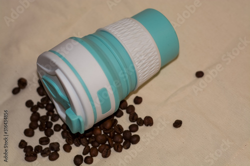 Blue reusable cup transformer for coffee and drinks take away made of food silicone. Repeated processing. Eko friendly.