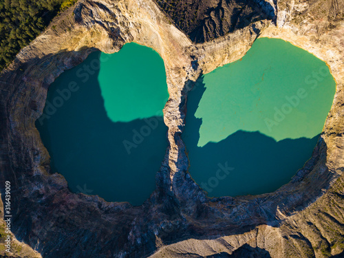 Beautiful morning aerial top view of Kelimutu Crater Lakes, Moni, Flores, Indonesia. Travel photo from drone.