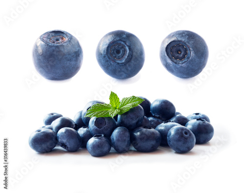 Bilberries isolated. Fresh raw berries isolated on white background. Collection. Blueberries on white background. Set of blueberries from different angles on white. 