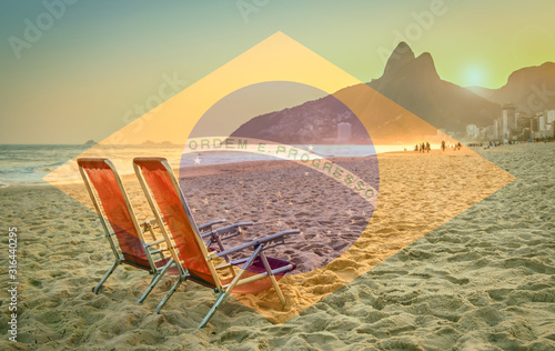 Beach deck chair against a backdrop of Two Brothers Mountain in Rio de Janeiro  Brazil