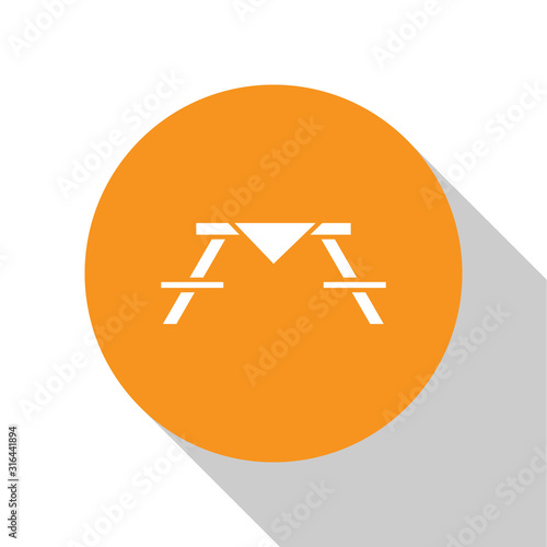 White Picnic table with benches on either side of the table icon isolated on white background. Orange circle button. Vector Illustration