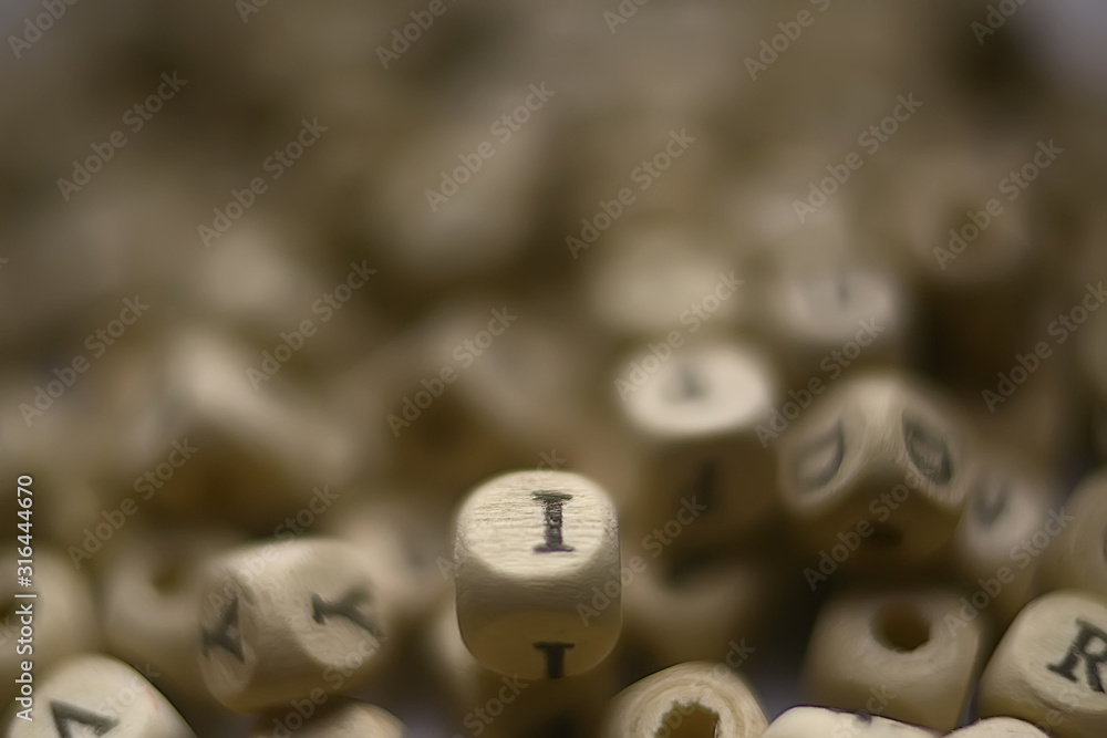 cubes beads letters alphabet / background of wooden cubes with alphabet letters, concept education reading, learning letters cubes beads letters alphabet / background of wooden cubes with alphabet letters, concept education reading, learning letters