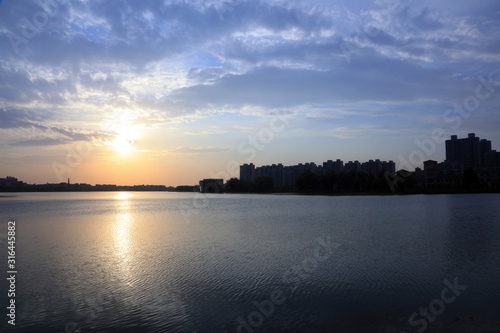 Waterfront city scenery in the evening, China