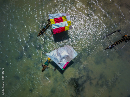 drone picture of madagascar piroque fishermen photo