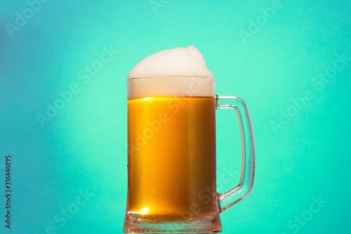 Golden cold beer glass foam...