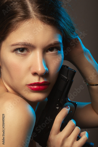 woman with gun