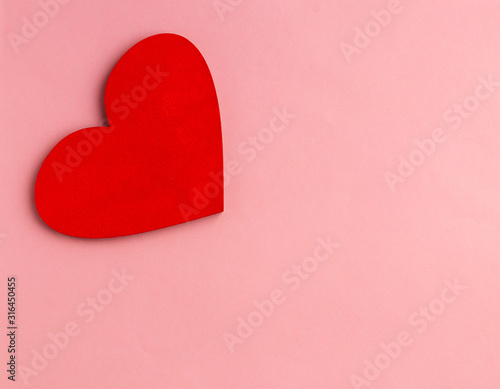 Red heart on a pink background
