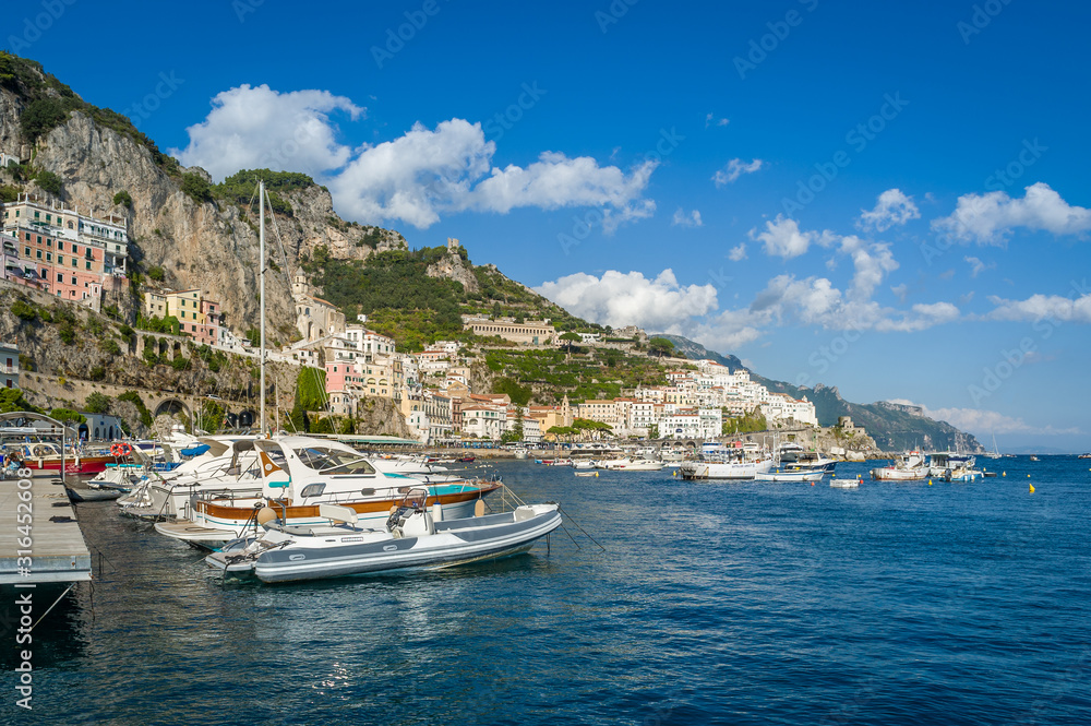 Amalfi harbor with lots of boats. Popular travel destination of Italy.