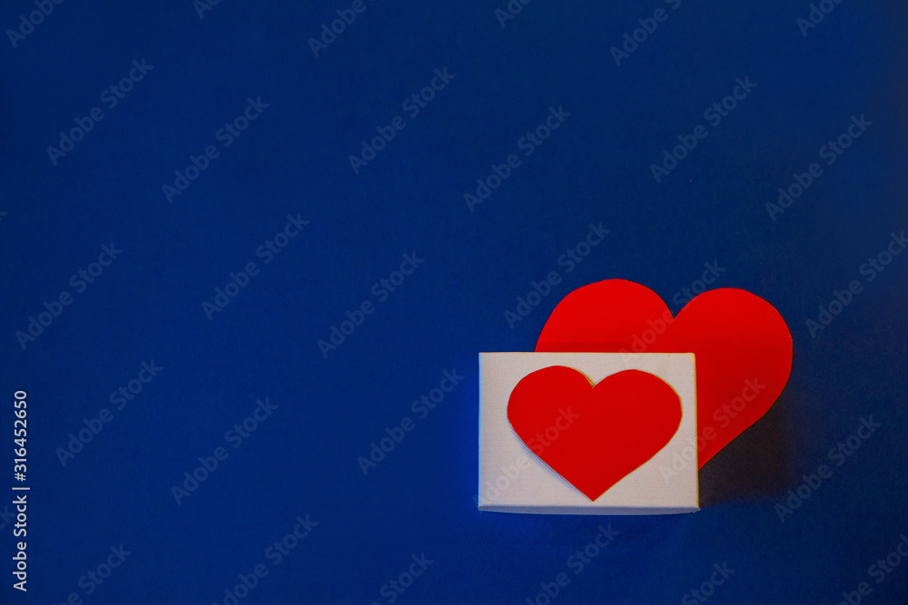 blue background, with space for text, with red flowers, postcard for Valentine's day and March 8, international women's day