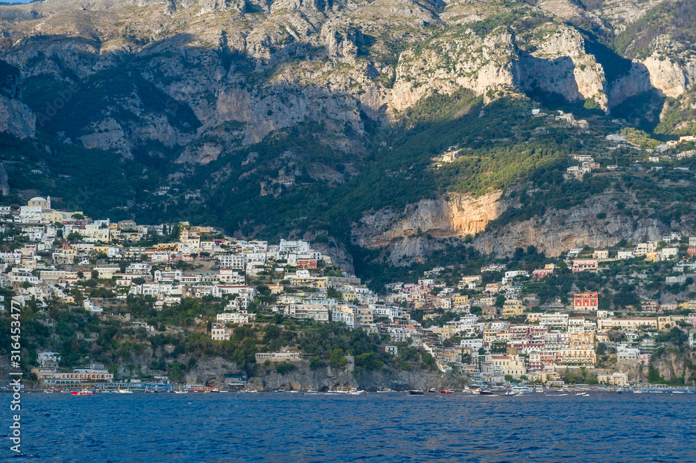Positano town and mountain slopes landscape. Amalfi coast, Italy