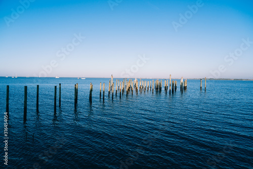 An unfinished pier on the peace river at Punta Gorda harbour and Charlotte harbour, Florida