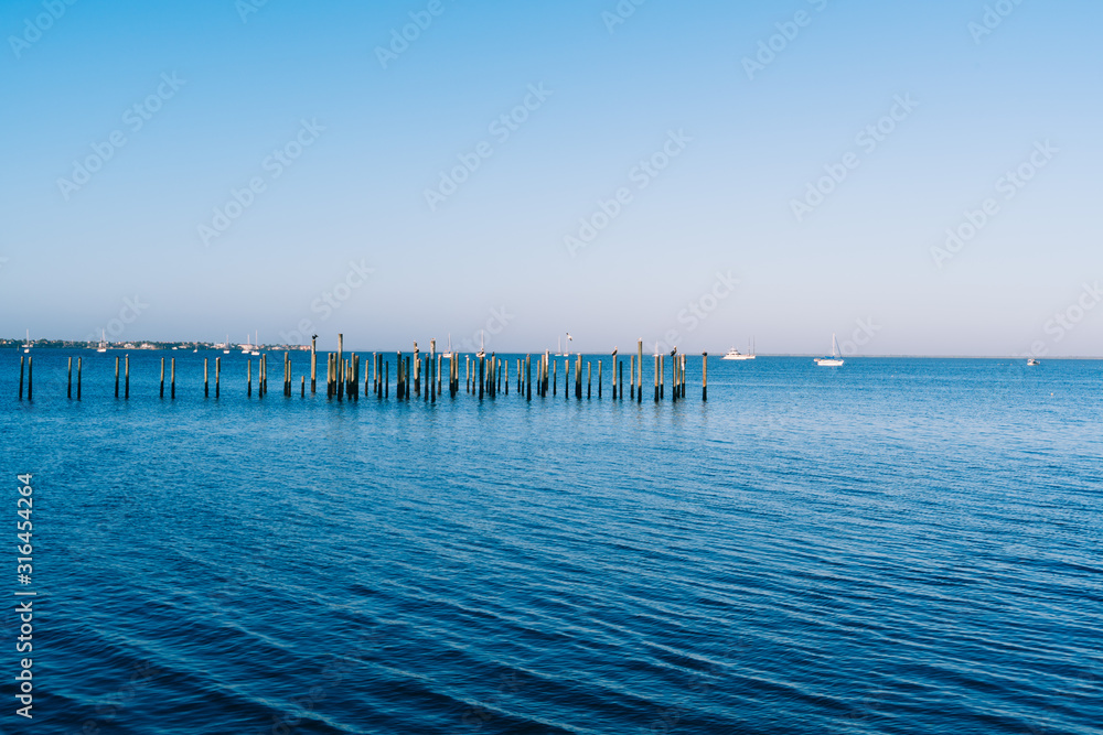 An unfinished pier on the peace river at Punta Gorda harbour and Charlotte harbour, Florida
