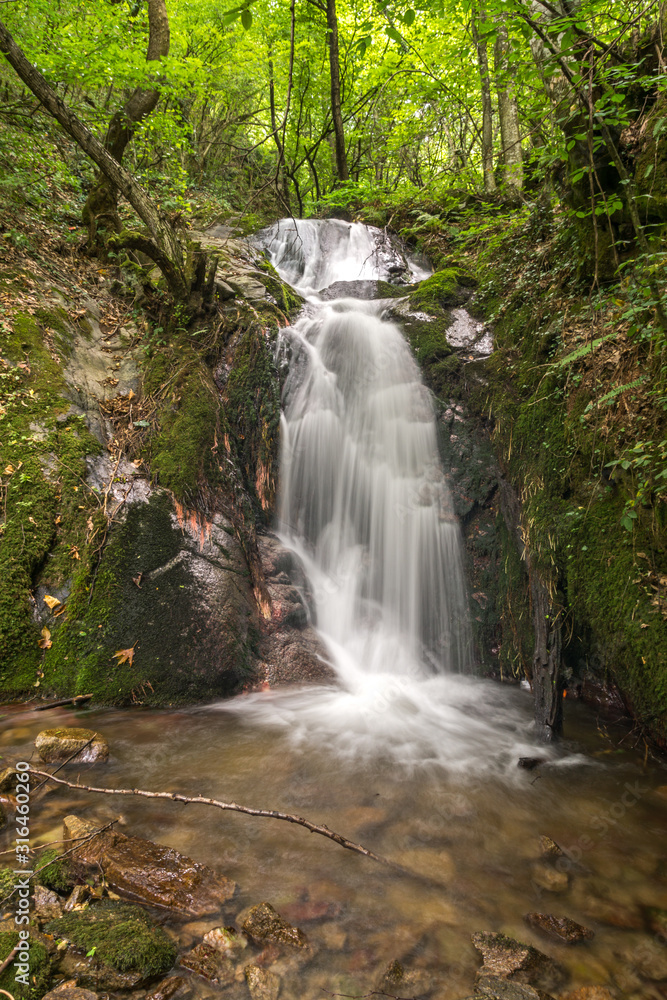 Fototapeta premium Gabrovo waterfall in Belasica Mountain,North Macedonia