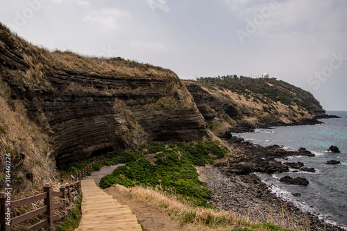 Outcrops of volcanic deposits at Eongal coastall walking trail, jeju island, South korea. photo