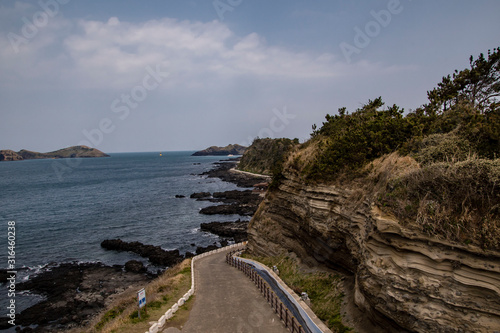 Outcrops of volcanic deposits at Eongal coastall walking trail, jeju island, South korea. photo