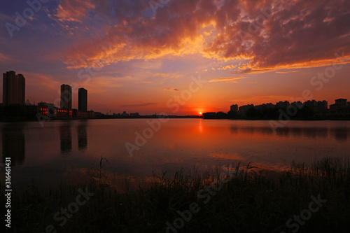 Waterfront city scenery in the evening, China