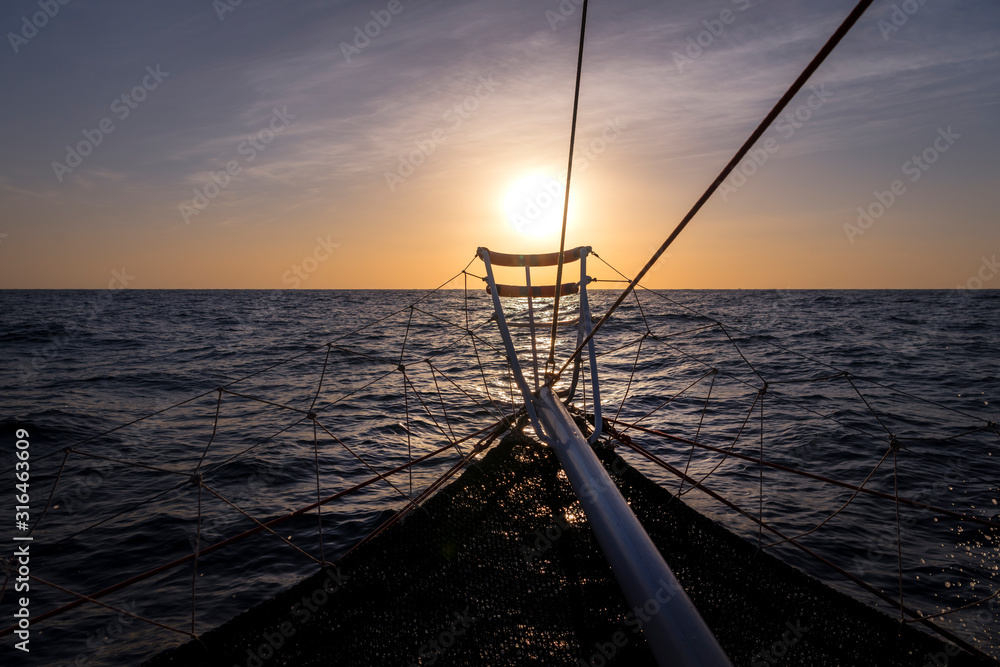 Sailboat at sunrise, Nelson Bay Australia