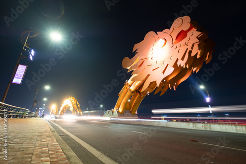 DANANG, VIETNAM - APRIL 19, 2019 - Dragon bridge at night, the famous bridge in Da Nang city, Dragon Bridge can be breath fire and water in weekend.