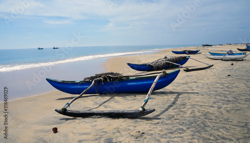 Photos Fishing boats on a beach near Batticaloa, Sri Lanka
