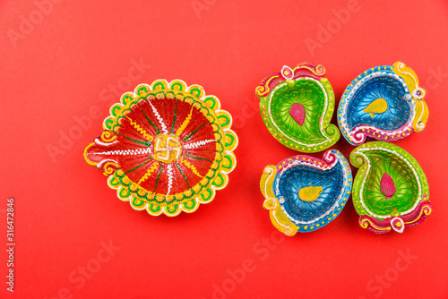 Happy Diwali Day, Flat lay top view Colorful Clay Diya lamps