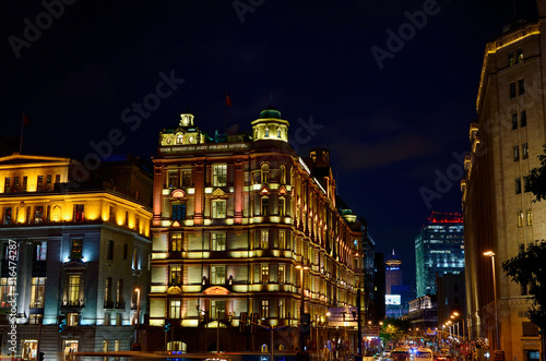 Colorful lights at night on the South Building Peace Hotel Nanjing road the Bund Shanghai China