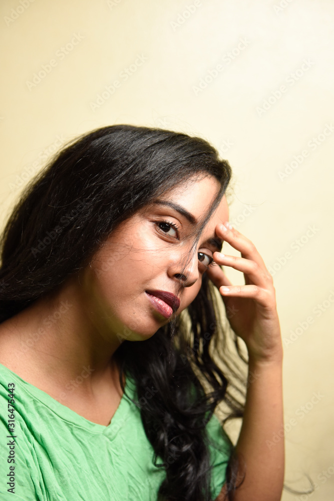 Young african woman wearing shirt over on colorful wood background thinking looking tired and bored with depression problems Young african woman wearing shirt over on colorful wood background thinking looking tired and bored with depression problems