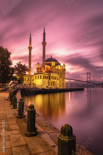 Fotografering Ortakoy mosque and Bosphorus bridge at sunrise, Istanbul, Turkey