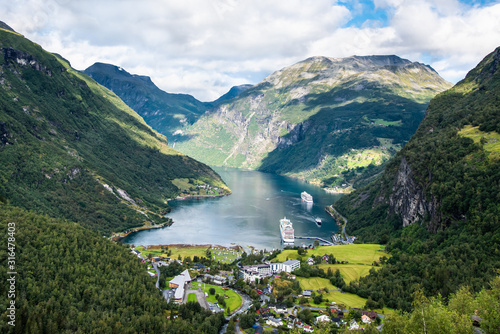 Beautiful aerial landscape view Geiranger village, harbor and fjord in More og Romsdal county in Norway. photo