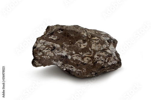 Mudstone on white background. Sedimentary rock is rock formed by deposition of mineral deposits from any rock formations on the Earth's surface. It was washed away by water, wind or glaciers. 