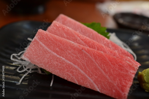 raw tuna on a cutting board