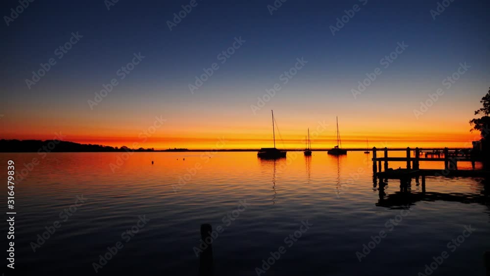 sailing boats and yachts floating on lake macquarie new castle
sunrise sunlight reflection over thje lake sailing boats and yachts floating on lake macquarie new castle
sunrise sunlight reflection over thje lake