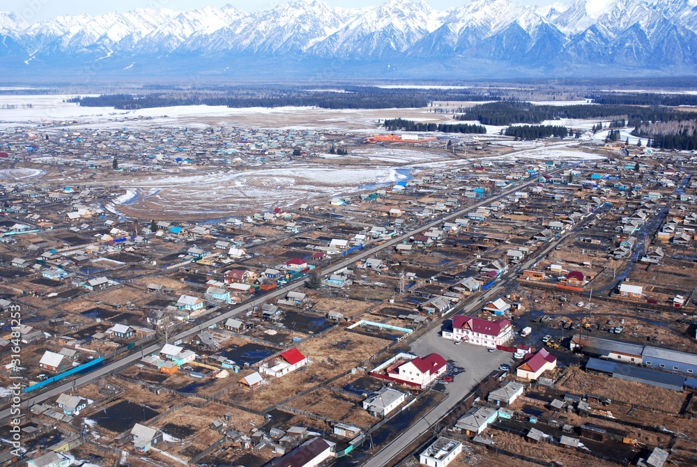 old village against the backdrop of the mountains aerial view old village against the backdrop of the mountains aerial view