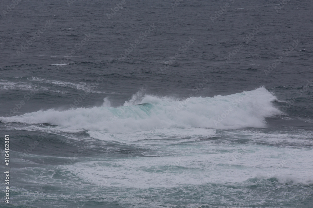 Nature scene image of ocean wave at Jeju Island, South Korea for Background or wallpaper use.