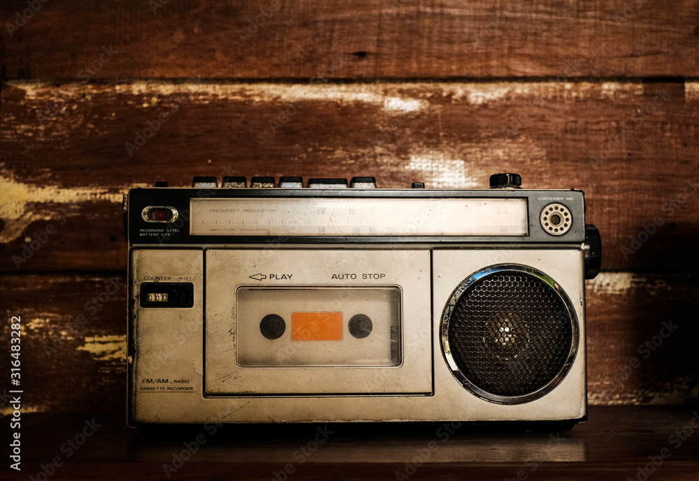 Fototapeta premium Vintage radio receiver, retro technology. vintage color tone.