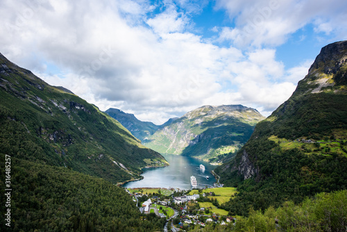 Beautiful aerial landscape view Geiranger village, harbor and fjord in More og Romsdal county in Norway.