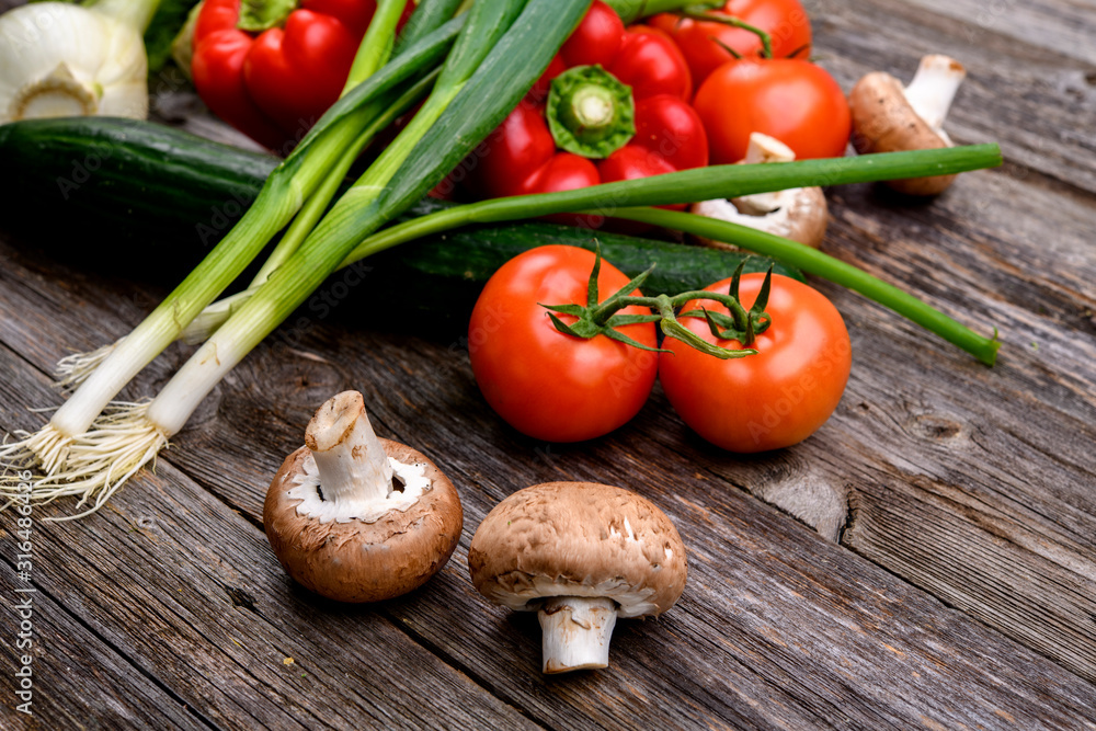 differentvegetables on wooden table differentvegetables on wooden table